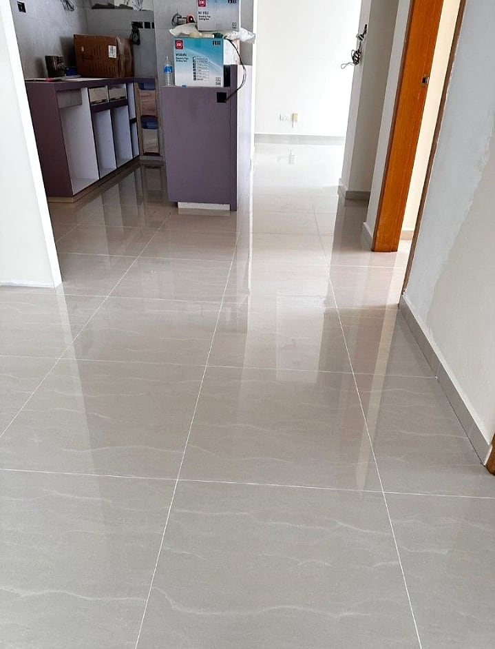 Completed tile regrouting floor with bright clean joints