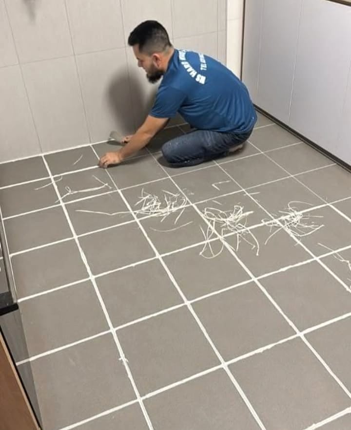 Tile and marble regrouting application across floor joints