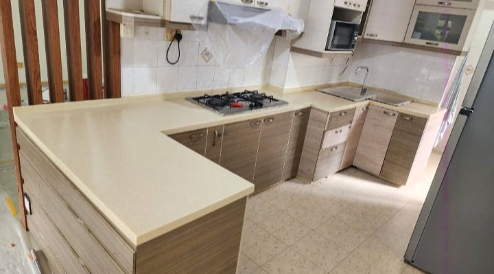 Kitchen stone countertop refreshed across a full kitchen layout
