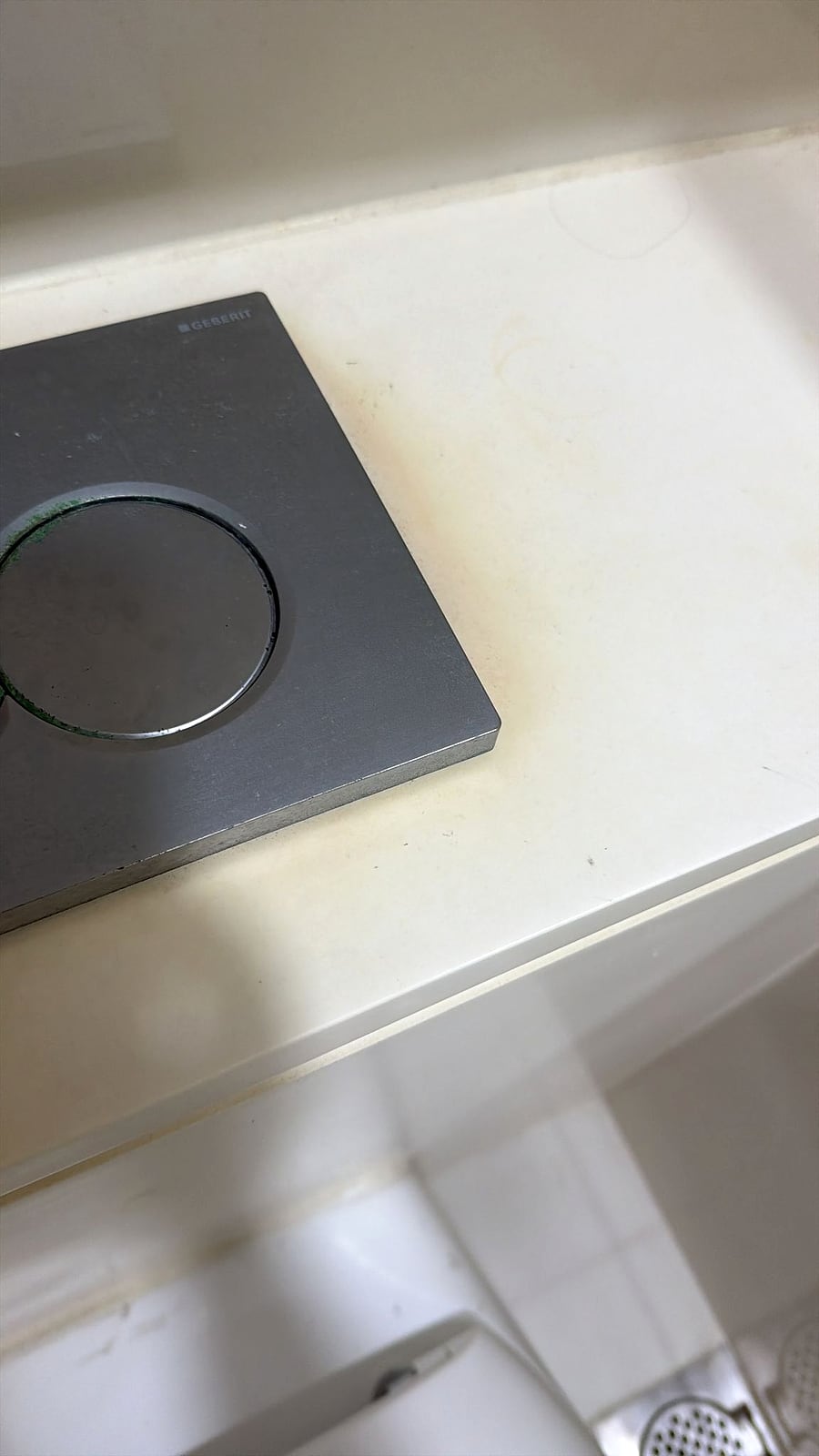 Close-up of vanity top stains and marks before polishing