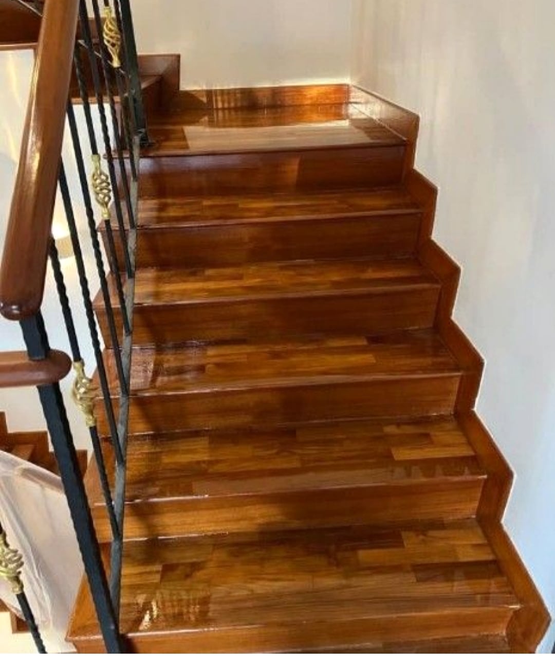 Glossy staircase varnish finish on timber steps