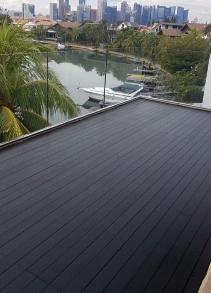 Dark restored balcony timber deck with a clean finished surface