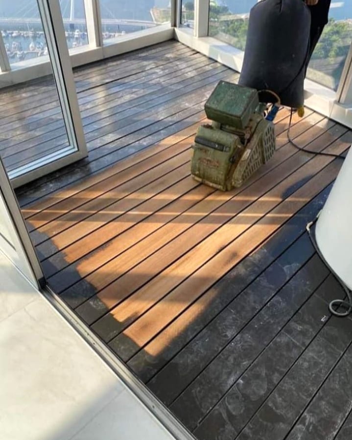 Timber deck sanding in progress before refinishing